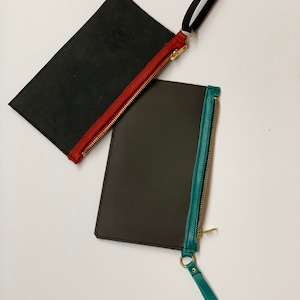 Cartera de piel, cartera con cremallera, cartera de pulsera, cartera de mano plana.