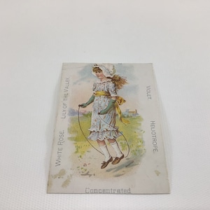 Antique White Rose Lily of the Valley Trade Card Girl Swinging Victorian Advertising Ephemera