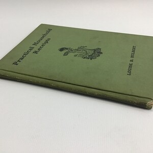 May include: A green book titled "Practical Household Receipts" by Louise D. Hulbert.