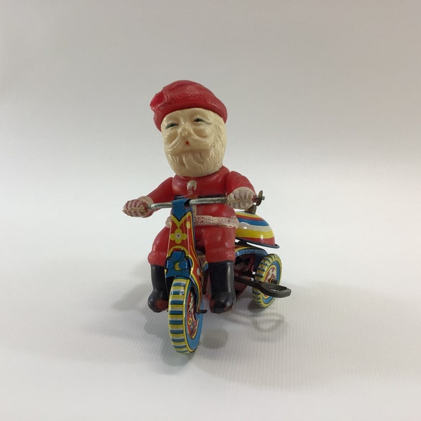 Wind Up Tin Litho and Celluloid Toy Santa Claus Cycle with Bell Vintage Suzuki Made in Japan Christmas Kitsch