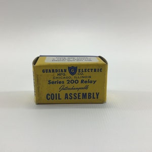 May include: A yellow box with blue text that reads "Guardian Electric Mfg. Co. Chicago, Illinois Series 200 Relay Interchangeable Coil Assembly".
