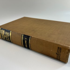 May include: A brown hardcover book with gold lettering on the spine. The title is "Harper's Encyclopedia of Classical Culture" and the volume number is "V".