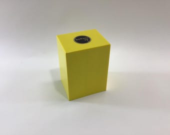 Bottoms Up Mid Century Novelty Storage Container Box Yellow and Black Hard Plastic Weighted Trap Door Bottom
