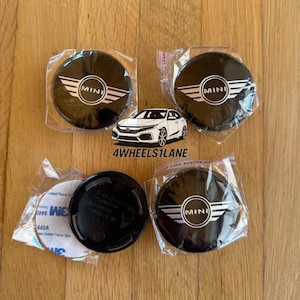 MINI Cooper Wheel Center Caps: Gloss Black Wing-Style Emblem (54mm, Set of 4)