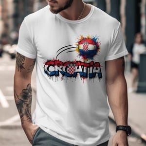 White t-shirt with "Croatia" text and a soccer ball design.