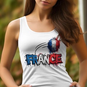 White tank top with "FRANCE" text and a soccer ball graphic.
