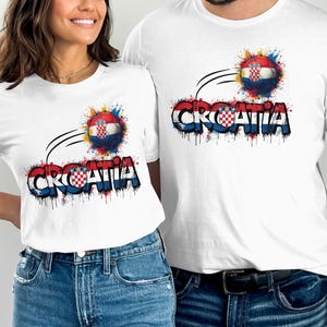 White t-shirts with "Croatia" text, a soccer ball, and paint splatters.