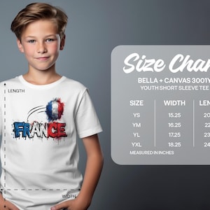 Boy wearing a white t-shirt with a "FRANCE" soccer ball graphic and a size chart.