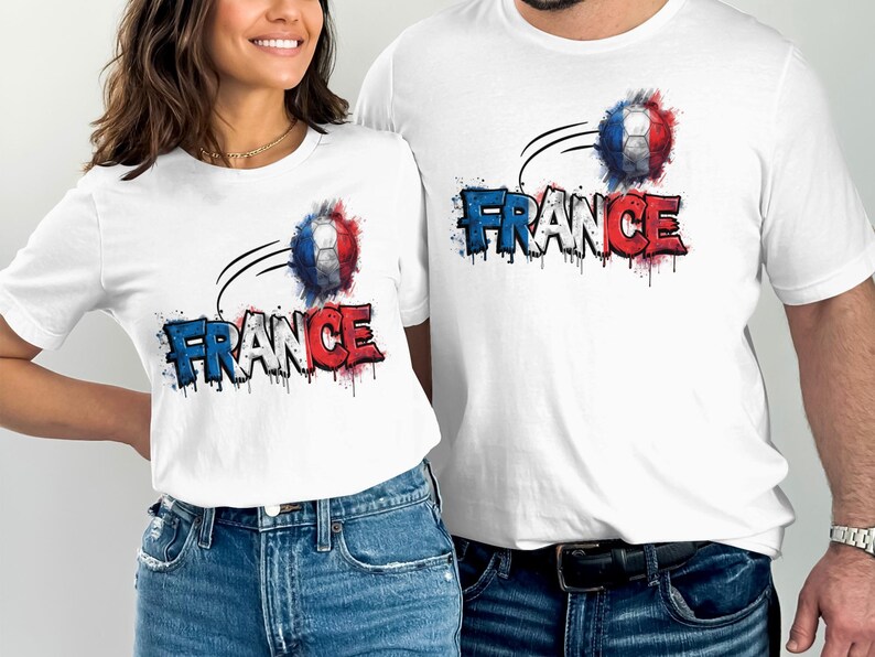 Two white t-shirts with "FRANCE" in red, white, and blue, and a soccer ball.