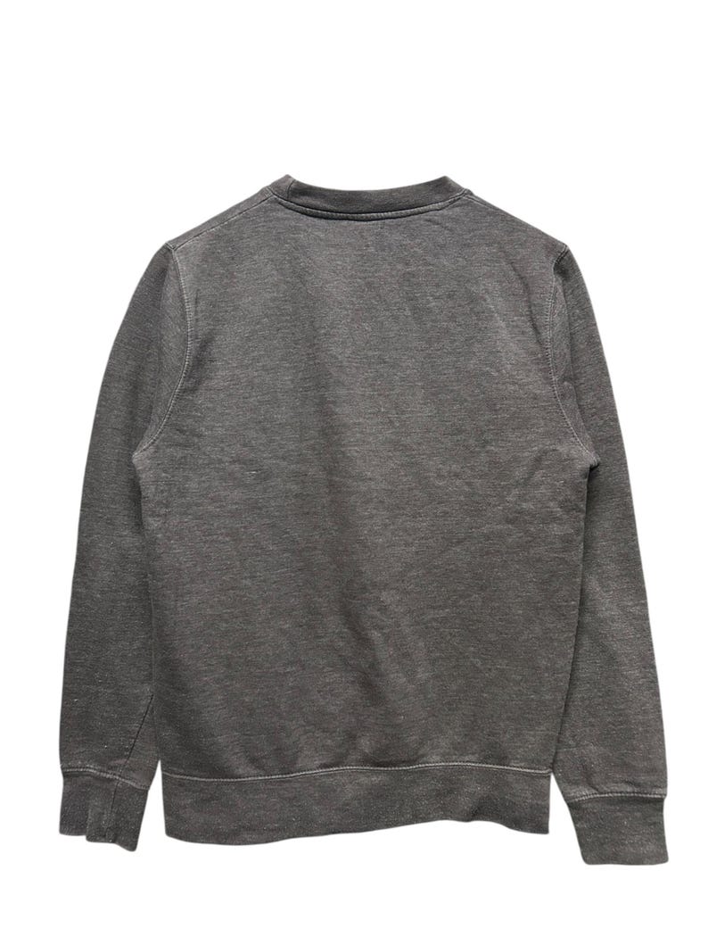 May include: A charcoal gray sweatshirt with a crew neck and ribbed cuffs and hem. The back view of the garment shows a simple, classic design, suitable for casual wear. The fabric appears to be a soft, knit material.