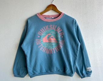 vintage Sweat-shirt ras du cou Quiksilver avec grand logo | Bleu Rose Pull Années 90 Surfwear International