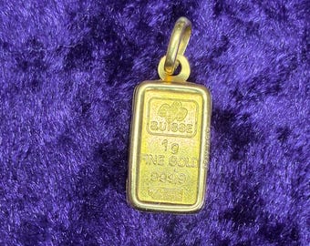1 gram .9999 fine gold Credit Suisse Gold Bar Pendant;  Precious Metal Collectible