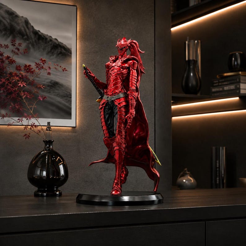 May include: A detailed collectible figurine of a warrior clad in metallic red armor with a flowing cape and a sword held at the side. The figure stands on a circular black base, featuring intricate plate armor designs and a ponytail hairstyle.