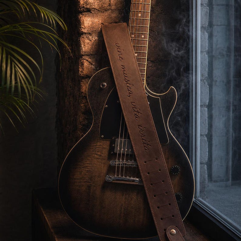 Personalized brown Crazy Horse leather guitar strap with engraved message on electric guitar, custom handmade musician gift for guitar player