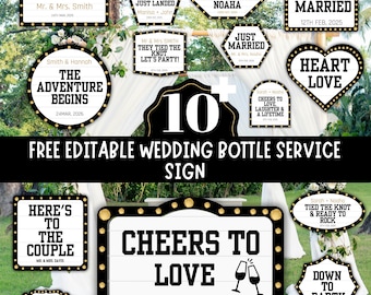 May include: A selection of black and gold wedding signs with white text, featuring phrases such as "Cheers to Love," "Just Married," and "The Adventure Begins." These signs are designed for a wedding bottle service.