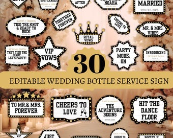 May include: A selection of black and gold wedding photo booth props with phrases such as "Heart Love," "Just Married," and "Cheers to Love." The props come in various shapes, including hearts, stars, and speech bubbles, ideal for wedding celebrations.