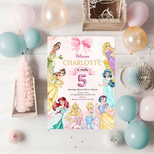 May include: A pink princess-themed birthday invitation featuring illustrations of various princesses. The invitation includes the name "Charlotte" and the number "5". Pastel balloons and decorative elements surround the invitation, creating a festive atmosphere.