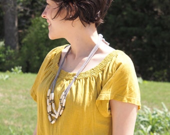 ivory wood rice bib necklace