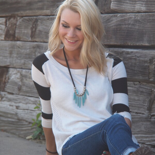 turquoise sticks and black necklace