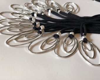 three ring oval necklace on black cotton