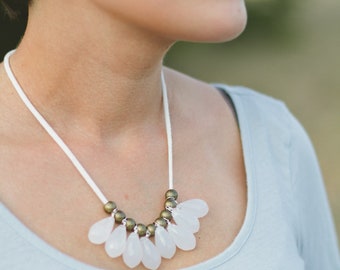 single layer milky opaque white briolette and golden brass necklace