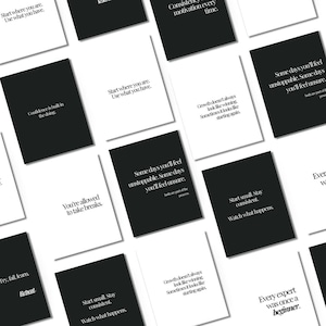May include: A selection of black and white cards displaying motivational quotes. The cards feature phrases such as "Start where you are," "Confidence is built in the doing," and "Every expert was once a beginner." The cards are arranged on a white surface.