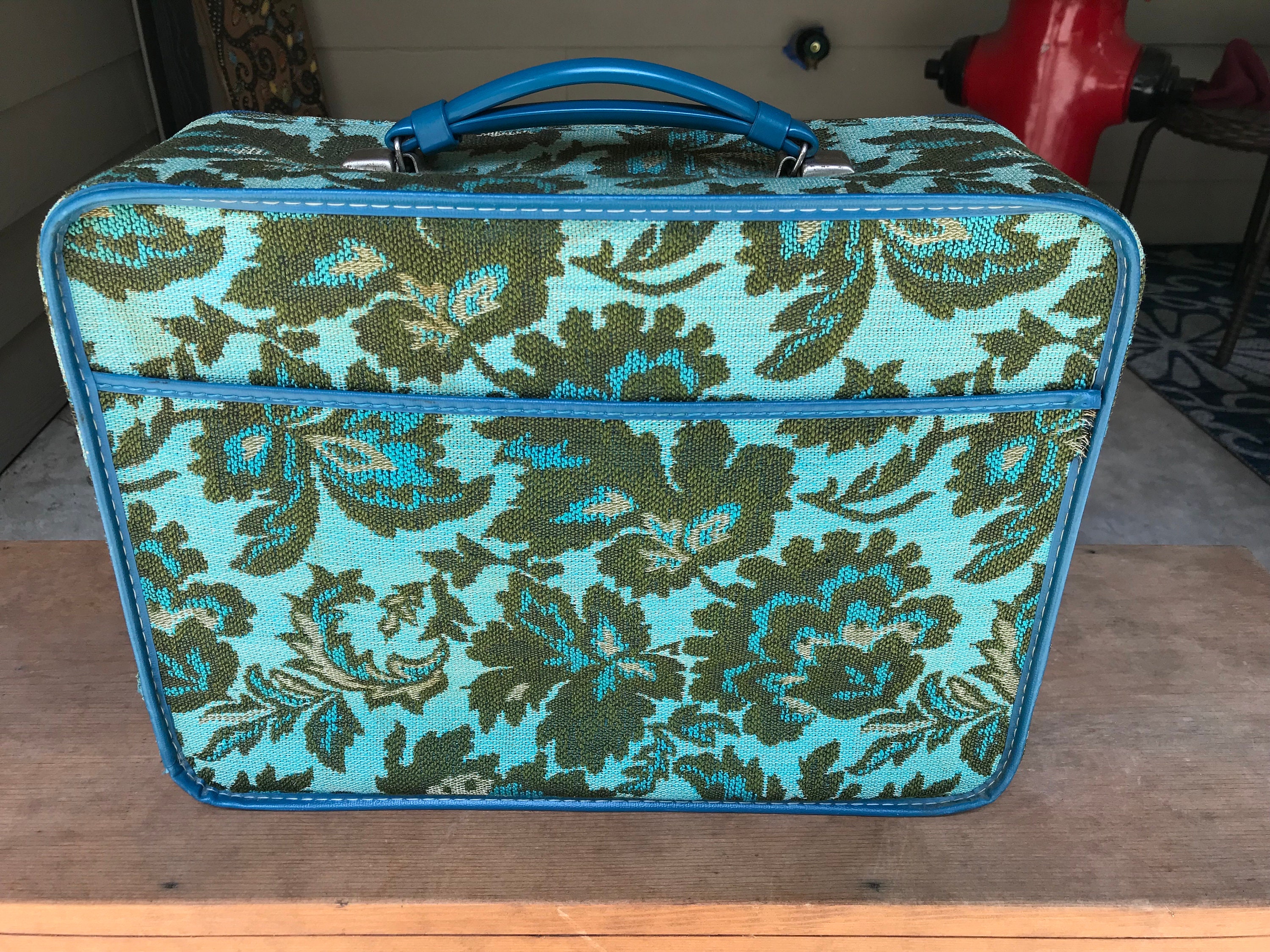 Avon suitcase sale