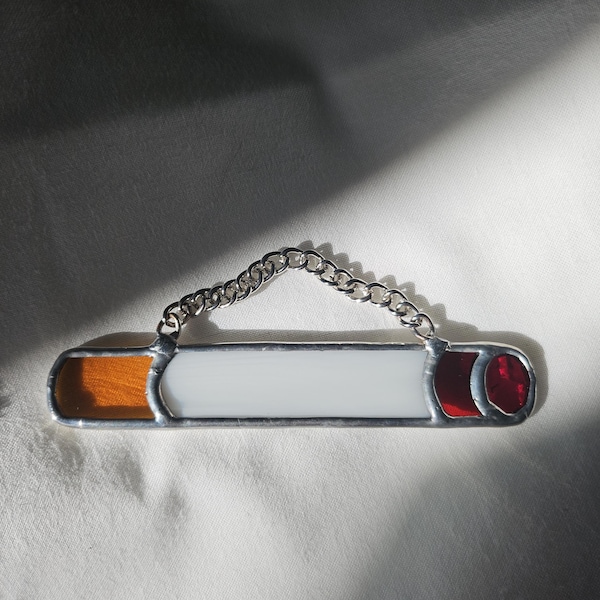 Decoración de cigarrillos en vidrieras