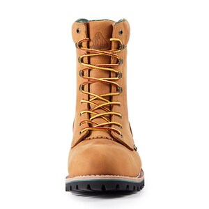May include: A tan work boot with yellow and red laces. The boot has a leather upper, a padded collar, and a lug sole. The boot features a logo on the tongue and is designed for durability and support. The boot is approximately 10 inches tall.