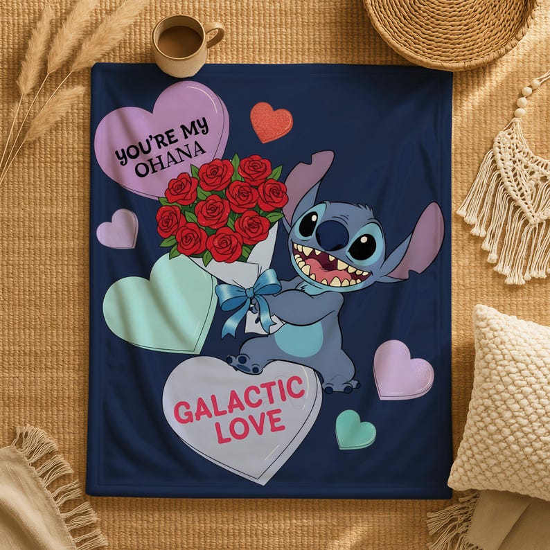 A blue blanket with a cartoon character holding a bouquet of red roses, surrounded by hearts and the text "You're My Ohana" and "Galactic Love".