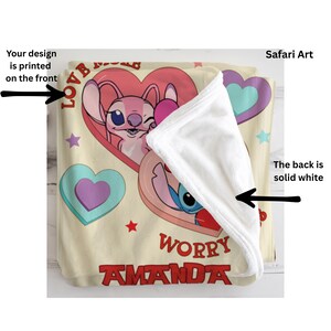 a blanket with a design of a character from the animated series "Stitch". The blanket has a printed design on the front, and the back is solid white.