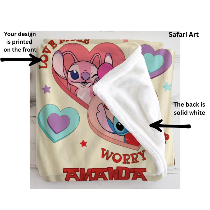 a blanket with a design of a character from the animated series "Stitch". The blanket has a printed design on the front, and the back is solid white.