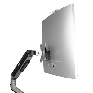 May include: A silver computer monitor mounted on a black and gray adjustable arm. The arm is attached to the back of the monitor with a silver bracket. The monitor has a curved screen and a white background.