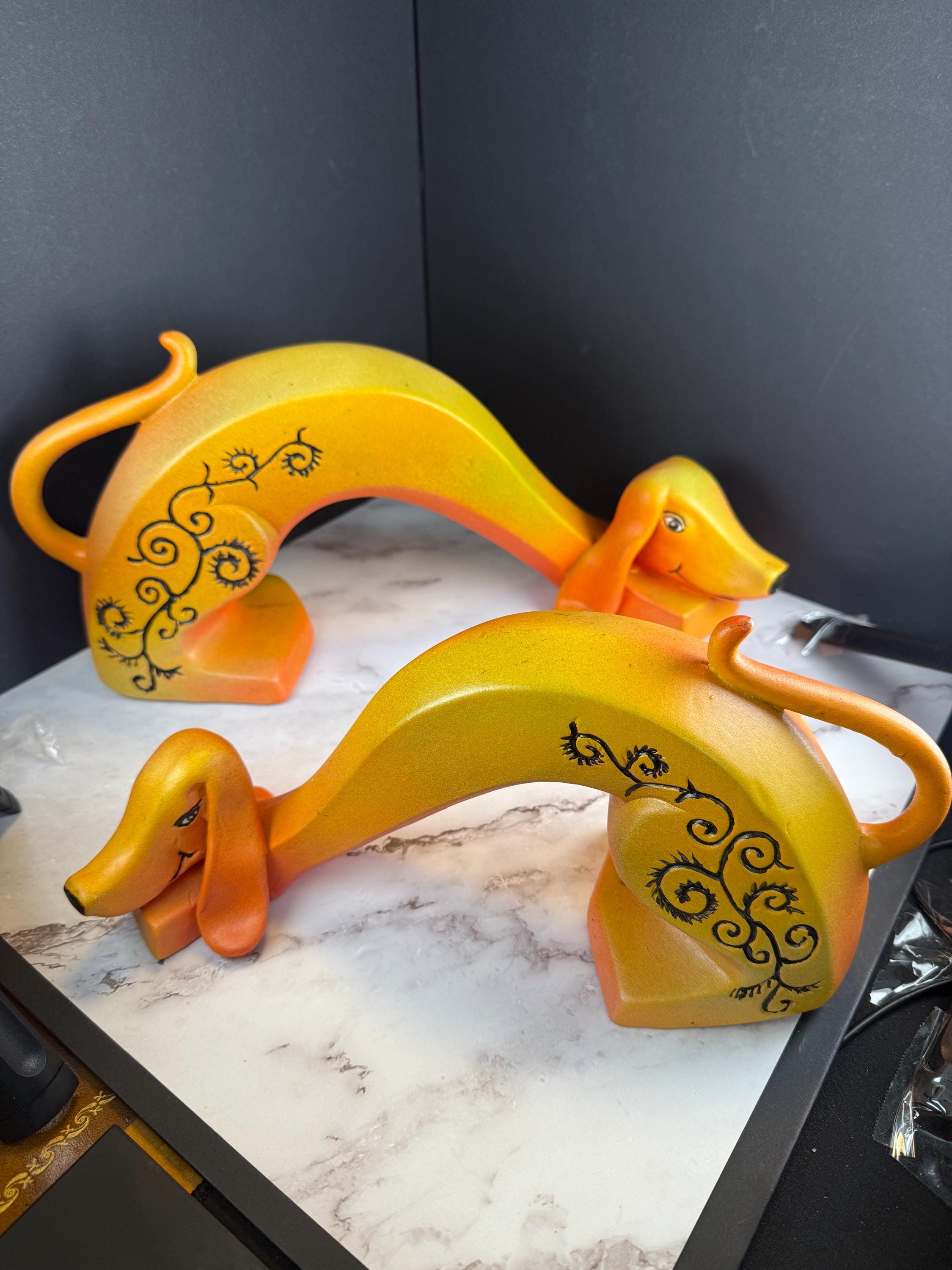 Vintage 60s Ceramic Dachshund Pair – Groovy Orange & Yellow with Black Scrollwork