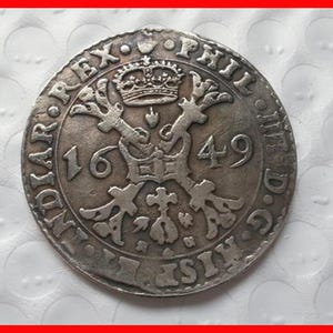 Rare 1649 Holy Roman Empire Thaler  Silver Color Coin - Explore Now!