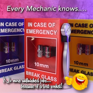 May include: A red, blue, and yellow emergency socket kit with the text "IN CASE OF EMERGENCY" and "10mm". The kit includes a silver socket wrench and sockets. The text "BREAK GLASS" is also visible.