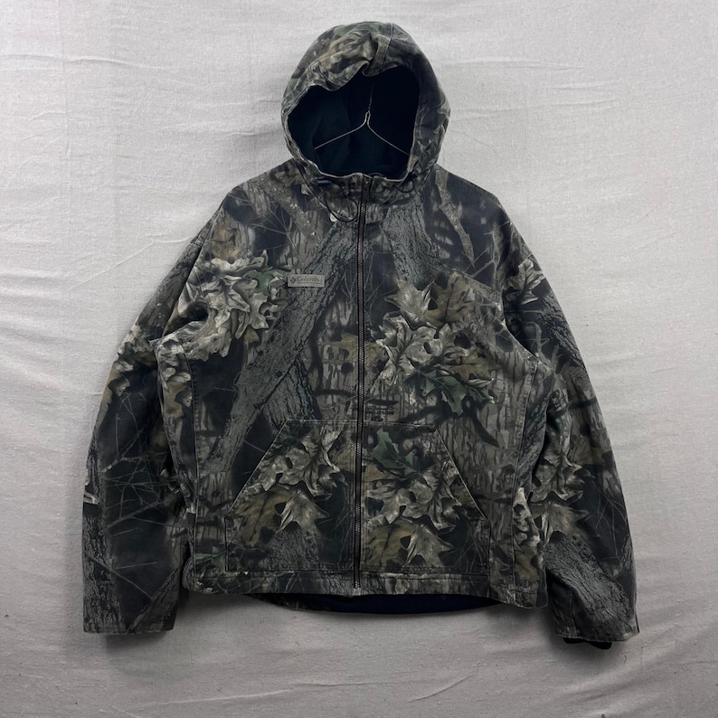 Chaqueta de trabajo con capucha Columbia para hombre, talla XL, estampado de camuflaje Mossy Oak, forrada de felpa, de lona con cremallera. imagen 1