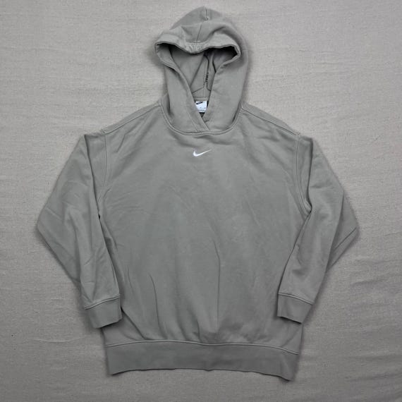 beige nike hoodie with black tick