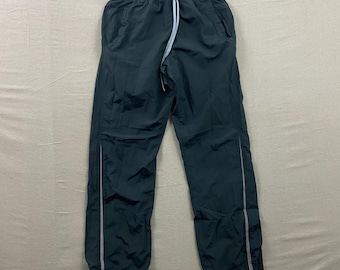 Nike trainingsbroek heren M donkergrijs windjack reflecterende streep sportkleding