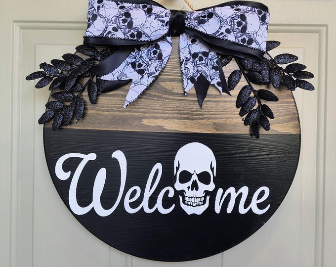 Featured listing image: Skull Welcome Sign - Gothic Halloween Door Hanger with Bow, fron door hanger, gift for skull lover, welcome skull decor, new home gift