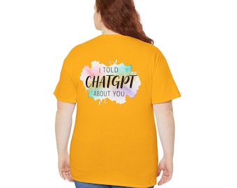 May include: Mustard yellow t-shirt with the text "I told ChatGPT about you" in a colorful watercolor design. The shirt is a short-sleeved crew neck.