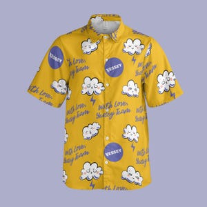 May include: Yellow button-down shirt with a cloud and lightning bolt pattern. The shirt features the text "YESSEY" in a blue circle and the phrase "with love, Yessey Team".