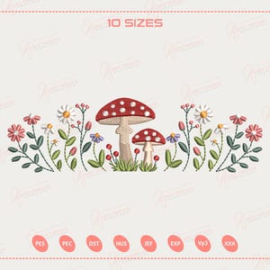 May include: An embroidered design featuring two red and white mushroom illustrations with a border of flowers and greenery. The design includes daisies, small red berries, and other colorful flowers. The text "10 SIZES" is at the top.