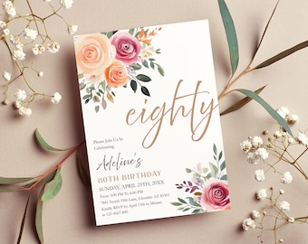 May include: An invitation for an 80th birthday celebration. The card features the word "eighty" in elegant script, floral accents in peach and pink, and event details. The invitation is surrounded by floral elements.