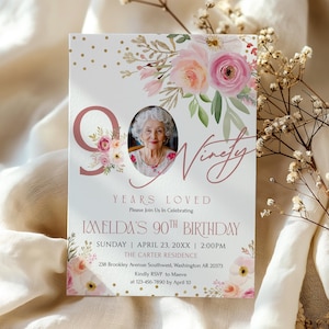 May include: A personalized invitation for a 90th birthday celebration. The design features a photo of an elderly woman, floral accents in pink and peach, and gold polka dots. The text reads "Ninety Years Loved" and details the event.