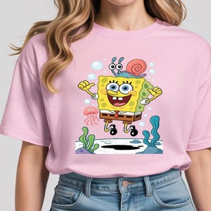 Funny SpongeShirt with Snail Buddy – Whimsical Sea Adventure Cartoon Tee – Vibrant & Happy Style
