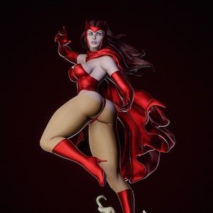 Puede incluir: Estatua de una superheroína vestida de rojo en una pose dinámica, con un body, capa, guantes y botas rojas. La figura tiene un tocado rojo y está de pie sobre una base estilizada. El texto "AVAILABLE ON PATREON" es visible.