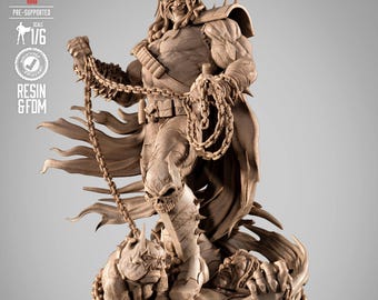 May include: A detailed resin statue of a muscular figure holding chains, with a menacing expression. The statue features a skull and other figures at its base, with the Batman logo visible. The statue is pre-supported and scaled at 1/6.