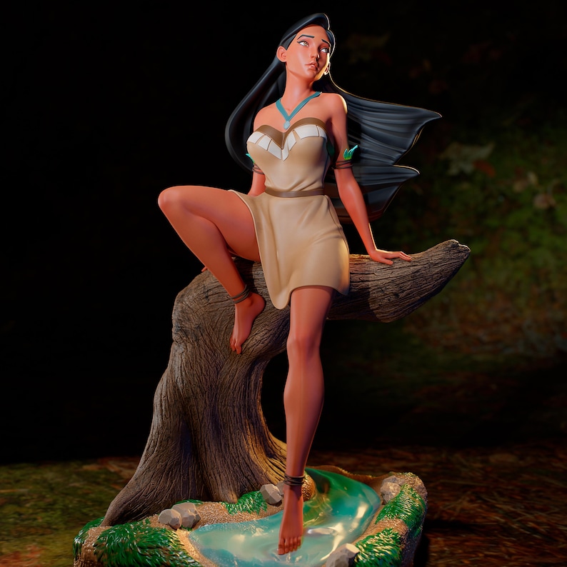 May include: A detailed figurine of a woman with long black hair, wearing a tan dress and turquoise necklace, seated on a tree branch. The figurine is posed near a small pool of water, with a dark background and forest details.