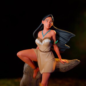 May include: A figurine of a woman with long black hair, wearing a tan dress with a brown belt and white accents. She has a turquoise necklace and bracelet. The figure is posed on a brown log against a dark background.